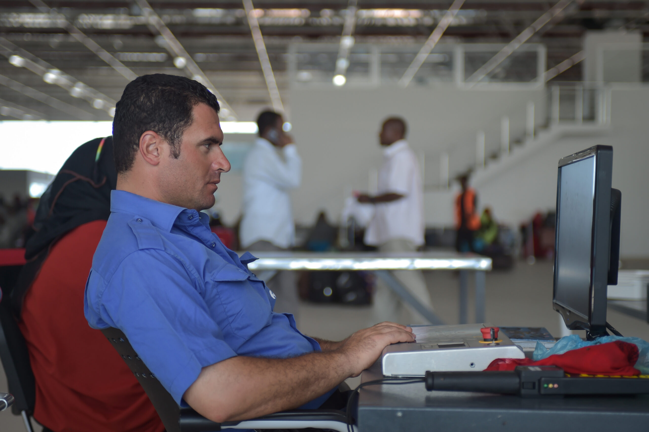 A security worker monitors baggage screening at Aden Adde Airport in Mogadishu in April 2016.