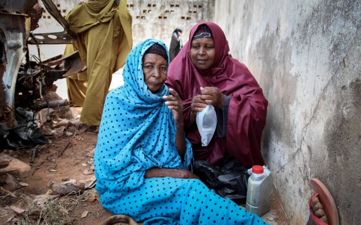 Women wait for care at a medical clinic in Kismayo in August 2013.