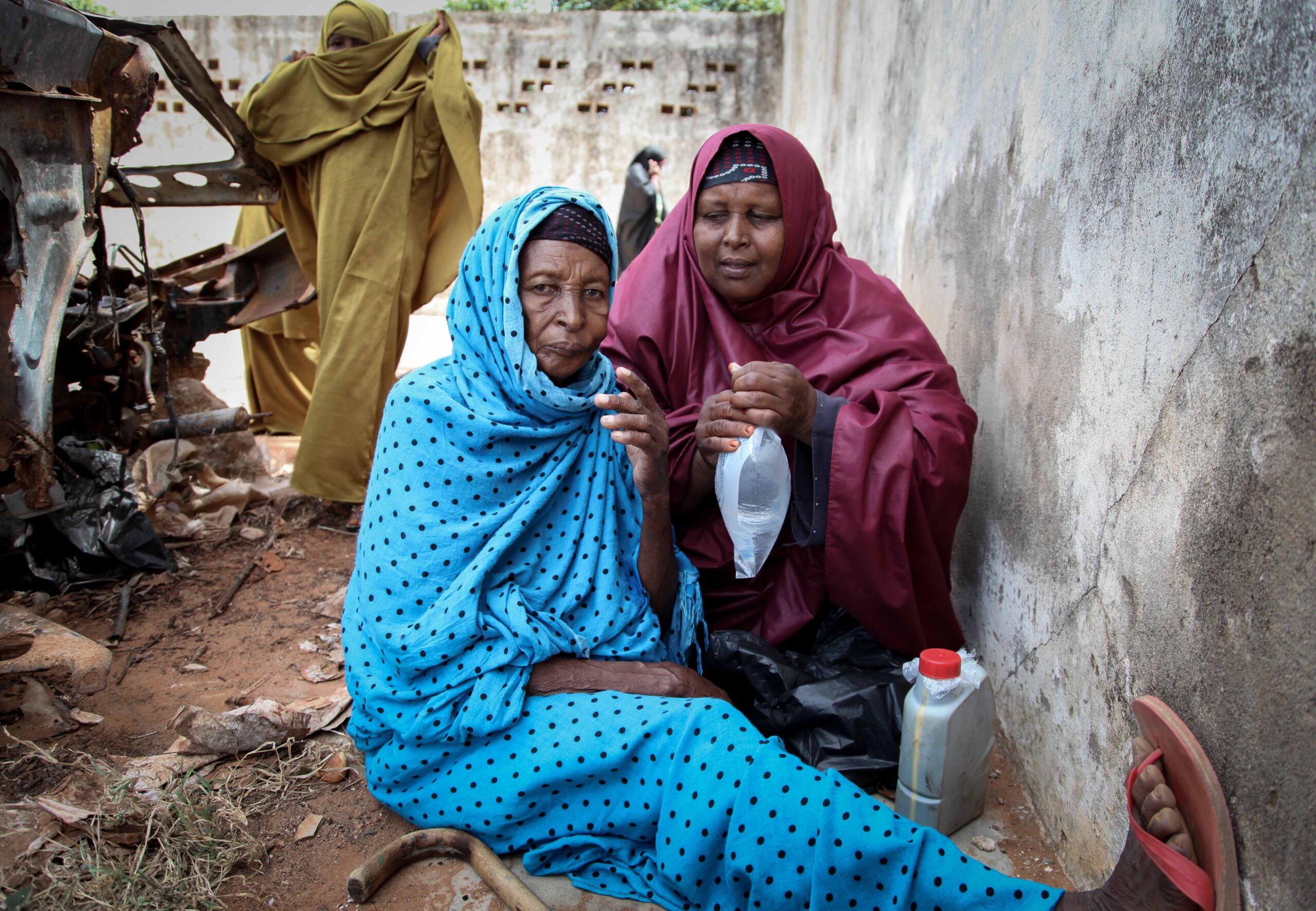Women wait for care at a medical clinic in Kismayo in August 2013.