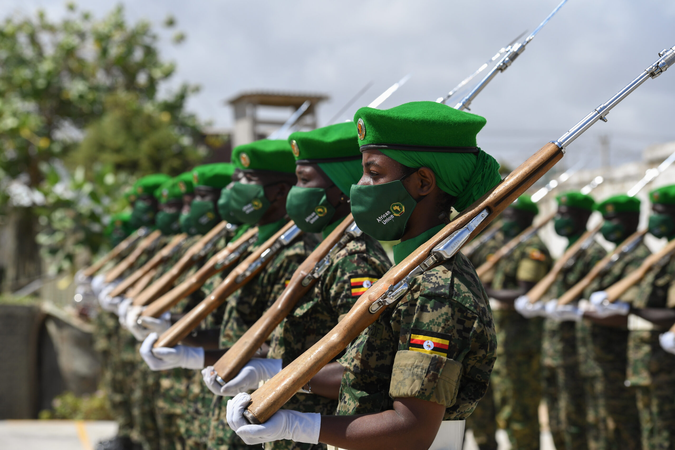 Ugandan AMISOM soldiers stand in formation in Somalia in September 2021.